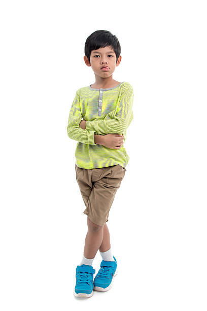 istock Asia little boy showing his tongue on white. 494534246