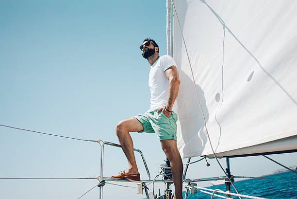 istock Low angle view of young bearded man standing on the 494534830