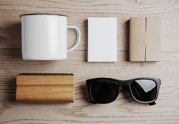 Set of  branding elements on the natural wood on a background. Black sunglasses