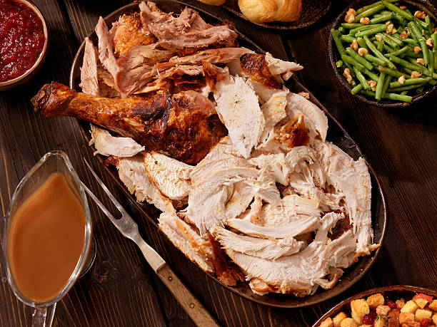 Turkey Dinner Turkey Dinner with Stuffing and All the Fixings -Photographed on Hasselblad H3D2-39mb Camera TURKEY MEAT stock pictures, royalty-free photos & images