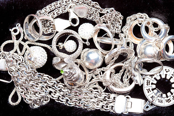 istock Silver jewlery on black background 494538274