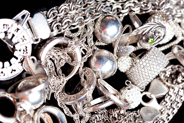 istock Silver jewlery on black background 494538352