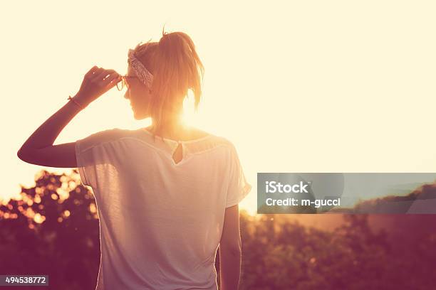 Chasing The Sun Stock Photo - Download Image Now - 2015, Adult, Adults Only