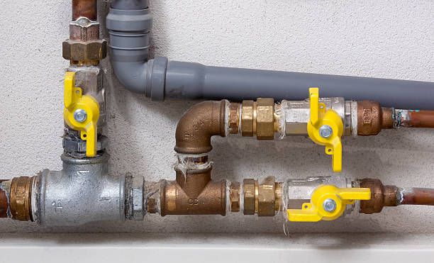 istock Pipes and Faucets in a Boiler Room 494538982