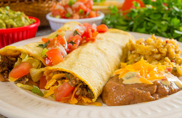 istock soft beef tacos with beans and rice 494539319