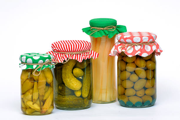 istock Glass Jar Containers of Preserved, Pickled Canning Vegetables 494540384