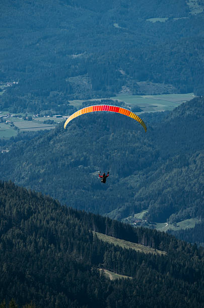 istock Paraglider over Austrian Alps with Karwanken Range on background 494540471