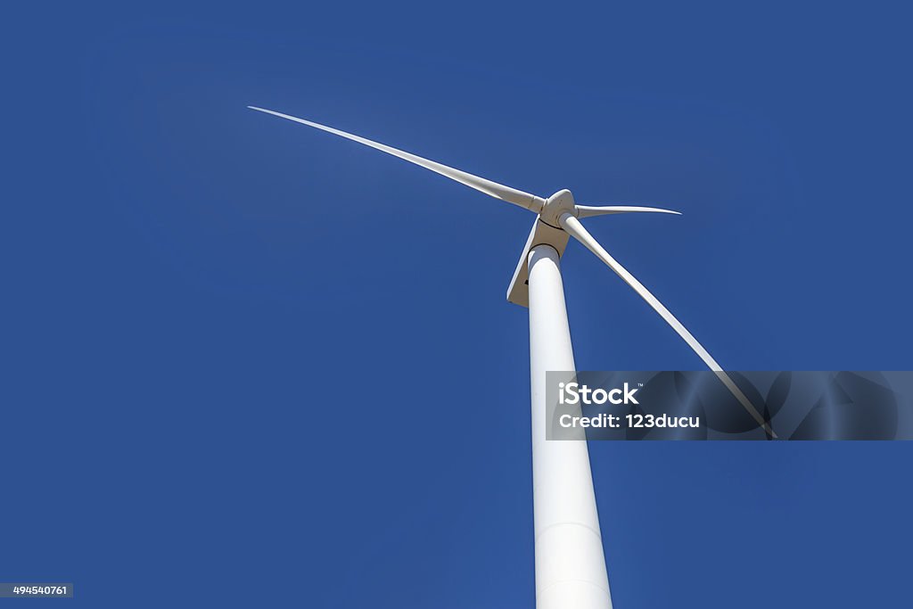 Wind Turbine Wind Turbine isolated on sky Single Object Stock Photo