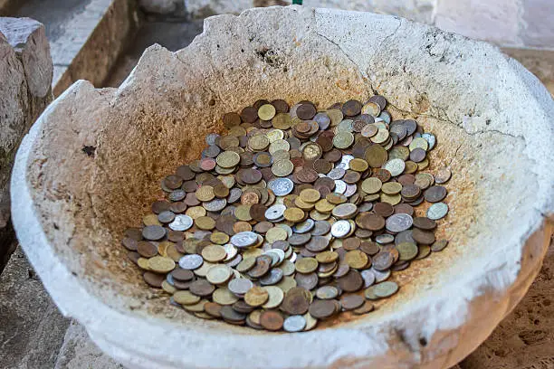 Photo of coins in an ancient amphora