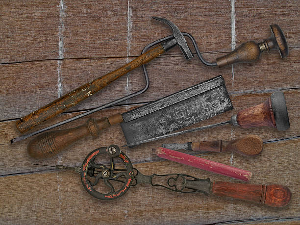istock vintage woodworking tools over drift wood 494541231