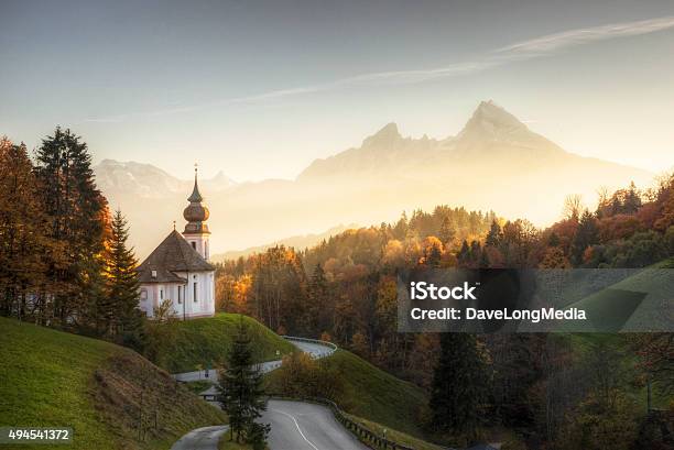 Bavarian Alps With Sunset Shining On Remote Church Stock Photo - Download Image Now - Germany, Bavaria, Church