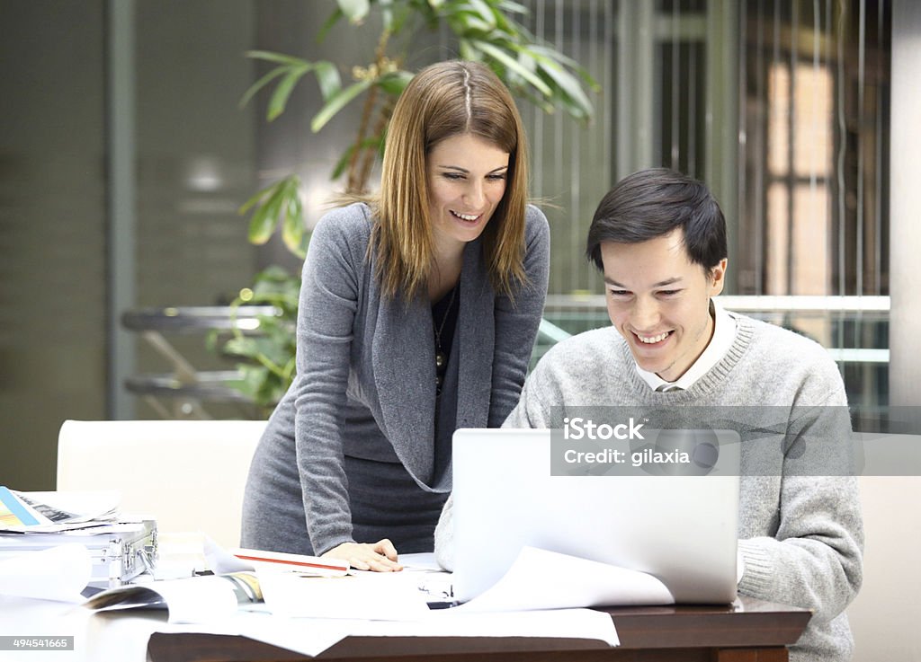 Designers at work. Designers/architects at work in their studio. 30-39 Years Stock Photo