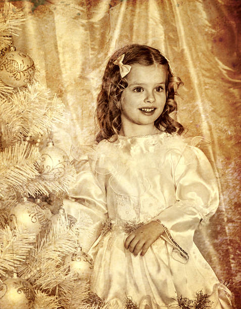 istock Little girle  near white Christmas tree 494542940