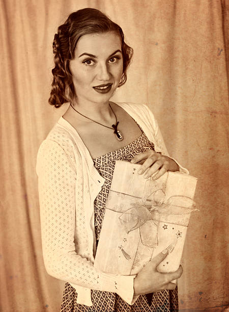 istock Woman holding gift box 494542960