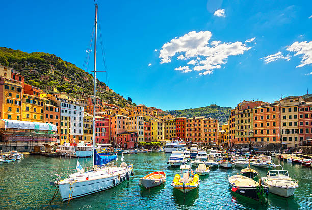 Camogli marina harbor, boats and typical colorful houses. Ligury Camogli marina harbor, boats and typical colorful houses. Travel destination Ligury, Italy, Europe. fish village stock pictures, royalty-free photos & images