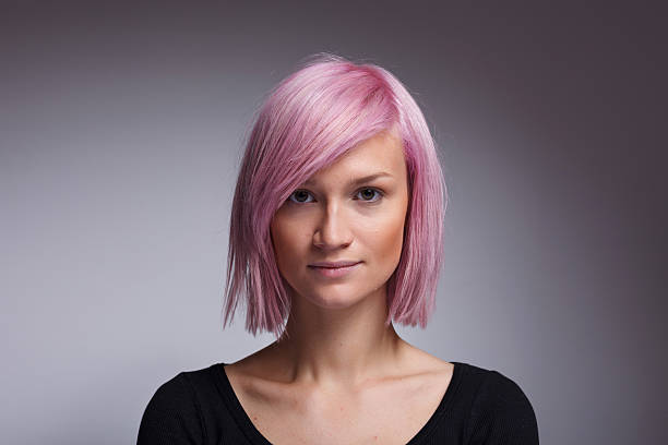 Pink Portrait of young pink haired woman pink hair stock pictures, royalty-free photos & images