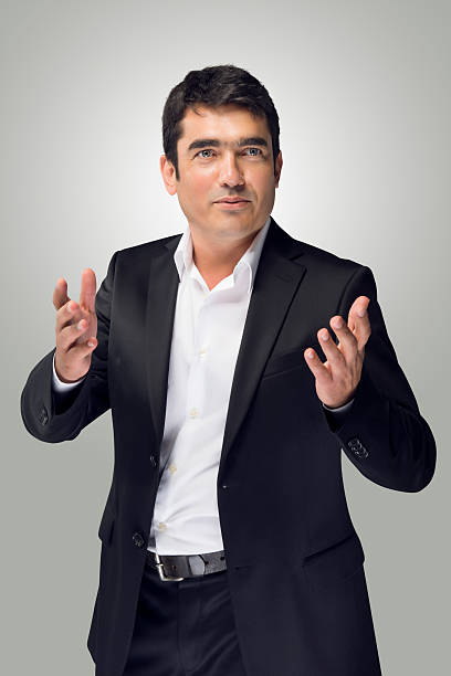 istock business man with hand gesture 494557429