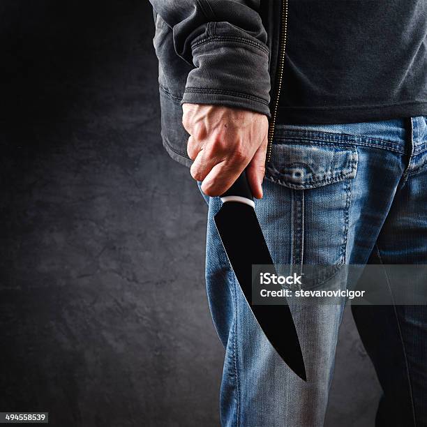 Evil Man Hold Shiny Knife Killer In Action Stock Photo - Download Image Now - Adult, Aggression, Anger