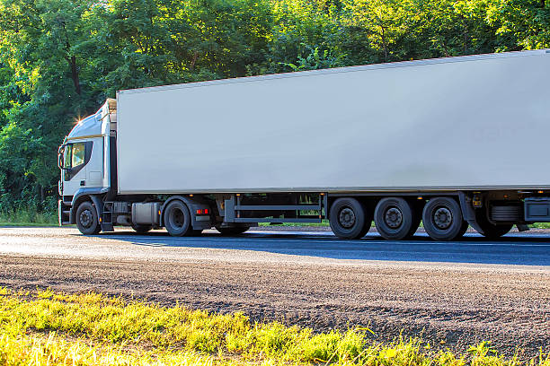 istock truck goes on the highway 494558740