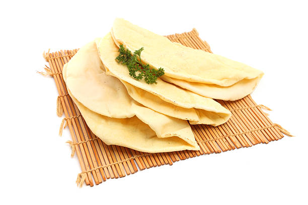 Tortilla Wrap Bread Tortilla Wrap Bread. Isolated on a white background shrak stock pictures, royalty-free photos & images