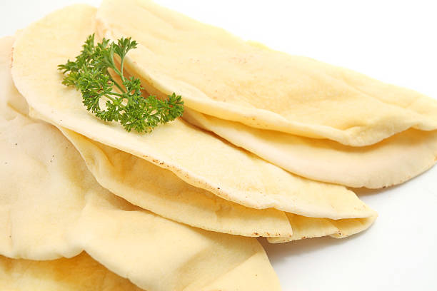 Tortilla Wrap Bread Tortilla Wrap Bread. Isolated on a white background shrak stock pictures, royalty-free photos & images