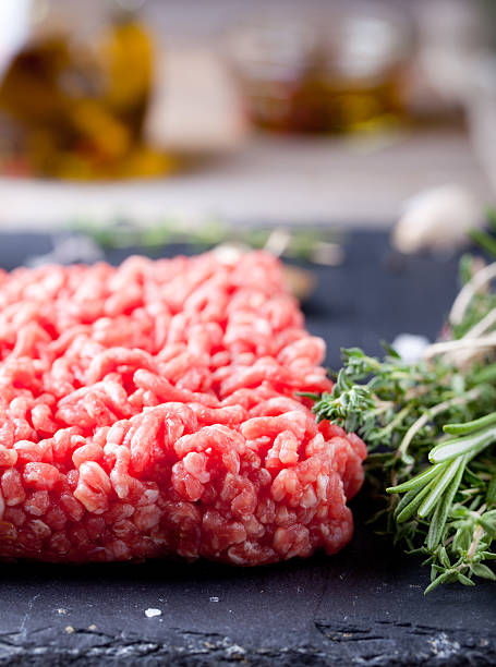 istock Minced meat on a slate stone black board. 494559546