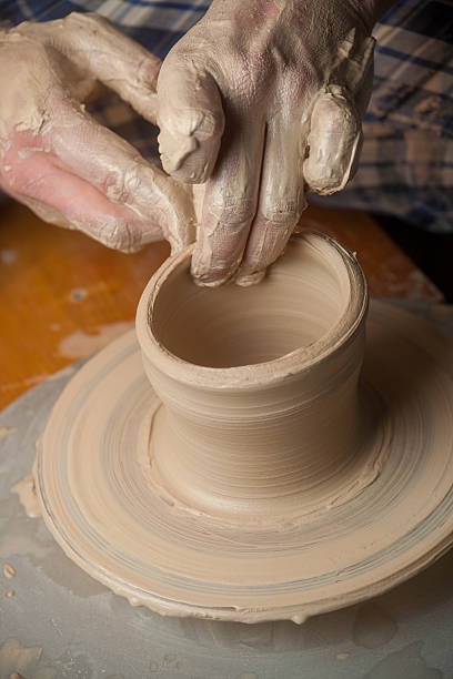 istock Hands of a potter 494561359