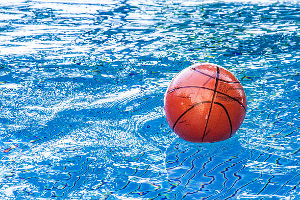 istock dirty small basketball on the water 494561839