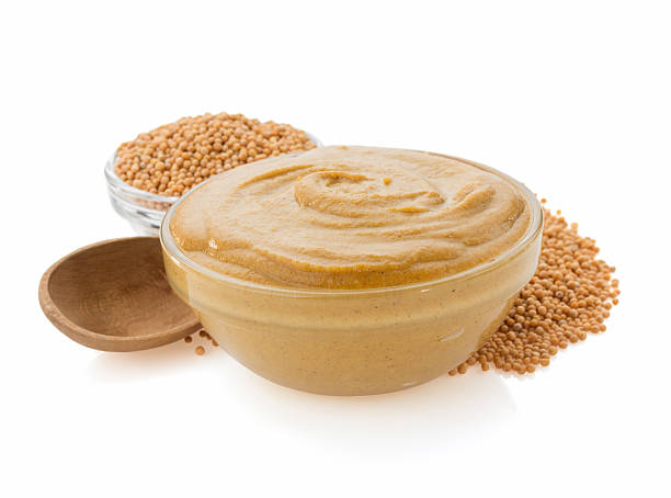 istock mustard sauce in bowl on white 494562325