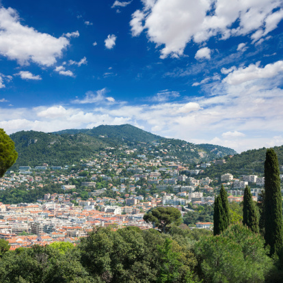 View over the city of Nice, France and the surrounding hillsides.