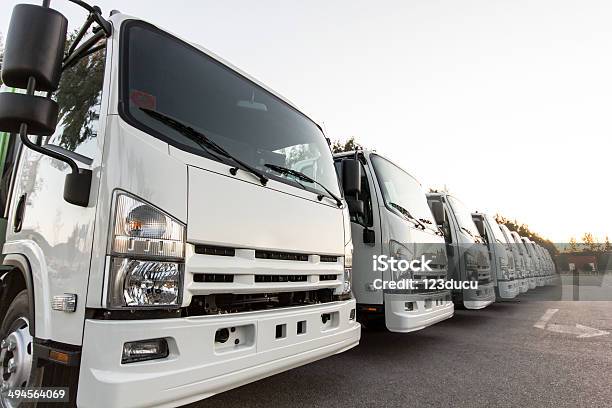 Trucks In A Row Stock Photo - Download Image Now - Truck, Convoy, In A Row