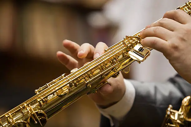 Photo of Saxophone in the hands of a musician