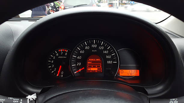 istock car driving at day,show instrument panel and traffic jam. 494567250
