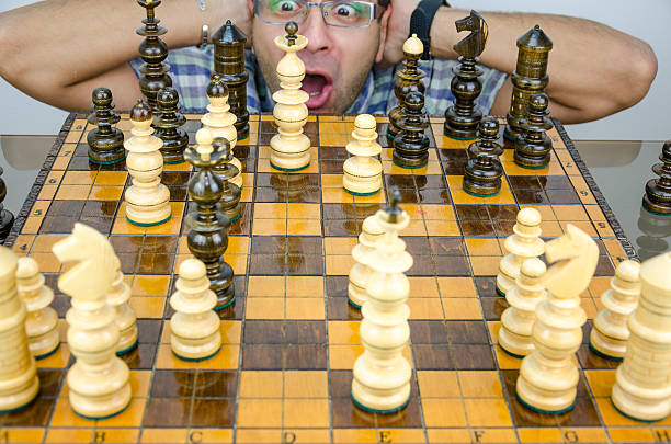 istock Businessman loses the game in chess 494568358