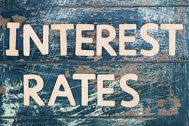istock Interest rates written with wooden letters on rustic wooden surface 494570114