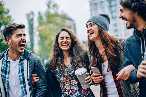 istock Young people smiling outdoors 494570696