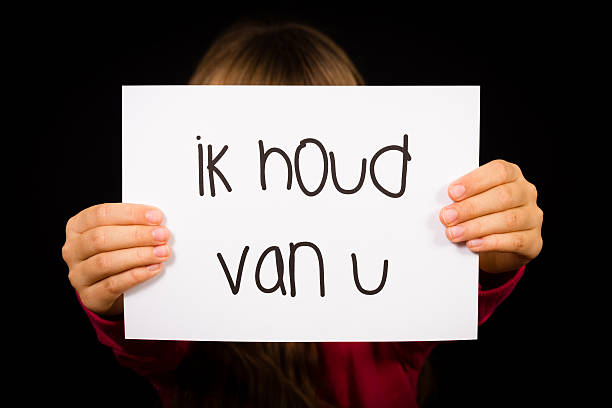 istock Child holding sign with Dutch words Ik Houd Van U 494583528