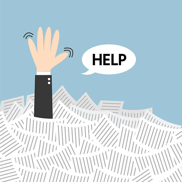 istock Businessman need help under a lot of white paper. 494584028