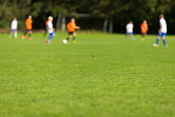 istock Blurred youth soccer players 494584662