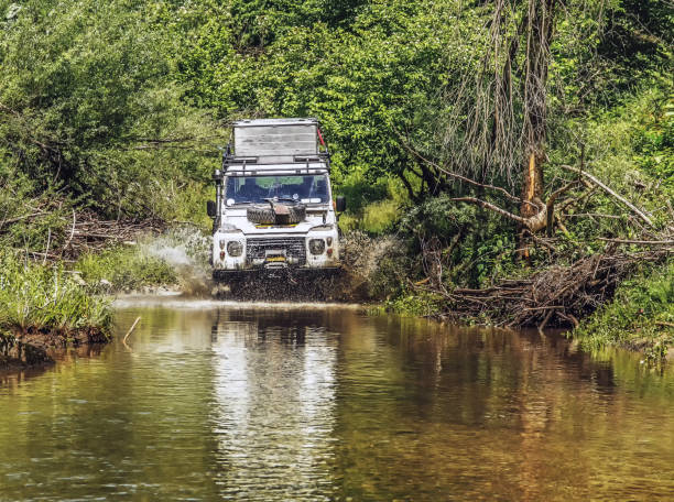A four wheel drive car on a forest road on the Fraser Island, Australia