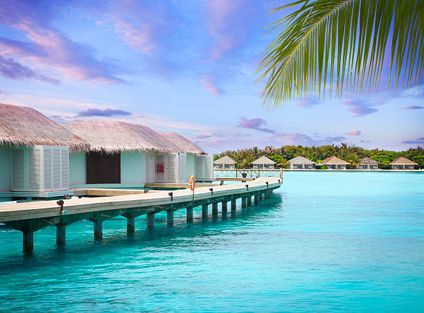 Maldivian water bungalow in the blue lagoon.