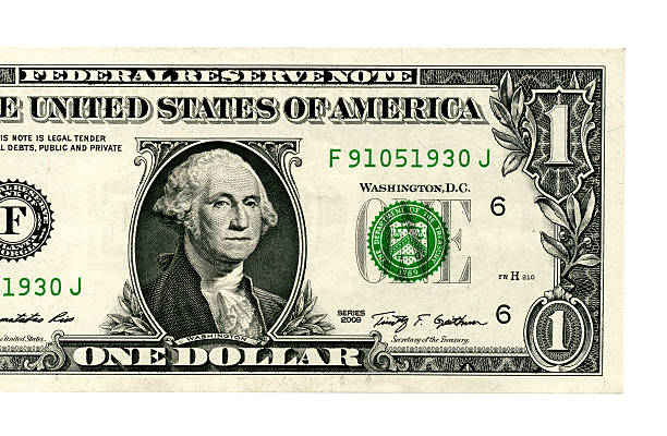 istock Close up of one dollar isolated on white background 494588350