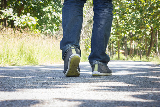istock Man wearing jeans walking on the unknown street. 494589002