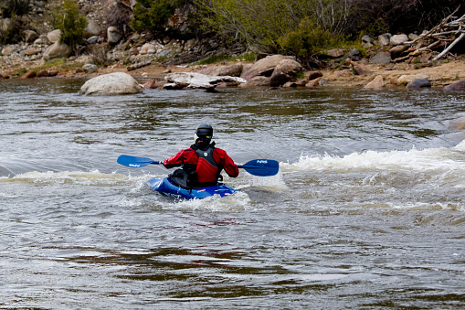 Buena Vista, Colorado, USA - May 23, 2015: Whitewater boaters competing in events at Paddlefest 2015 in Buena Vista Colorado on whitewater rapids on the Arkansas River near South Main Street