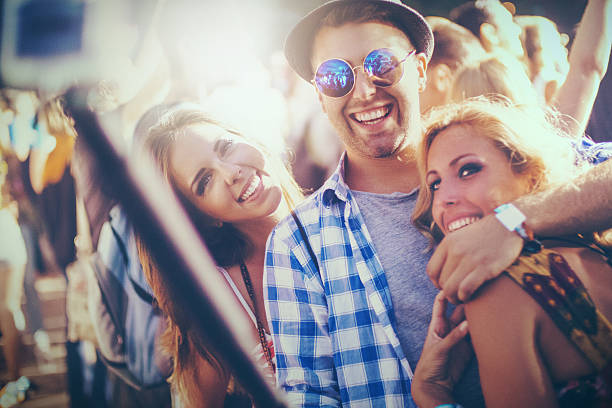 istock Three friends taking selfies at a party. 494592672