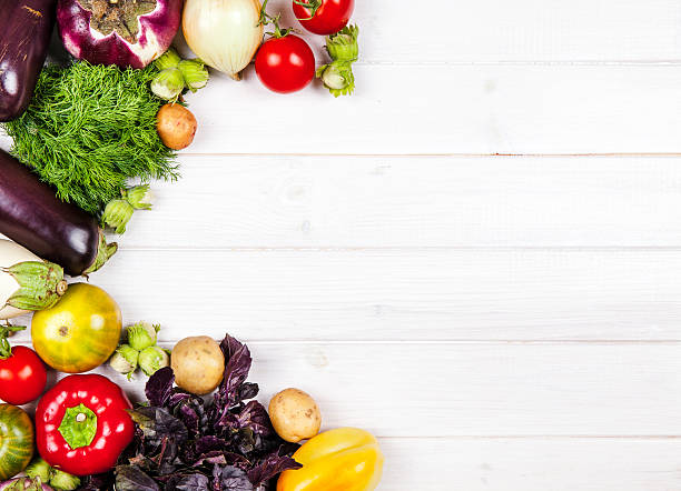 istock fresh vegetables on white wooden background 494595336