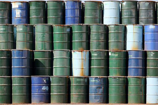 stack of oil barrels background