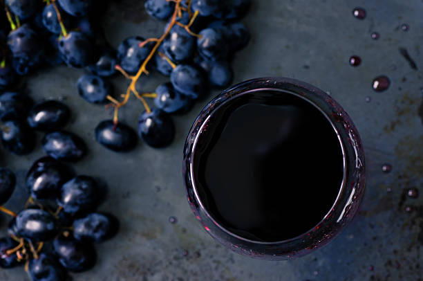 istock Red wine in a wineglass top view 494596020