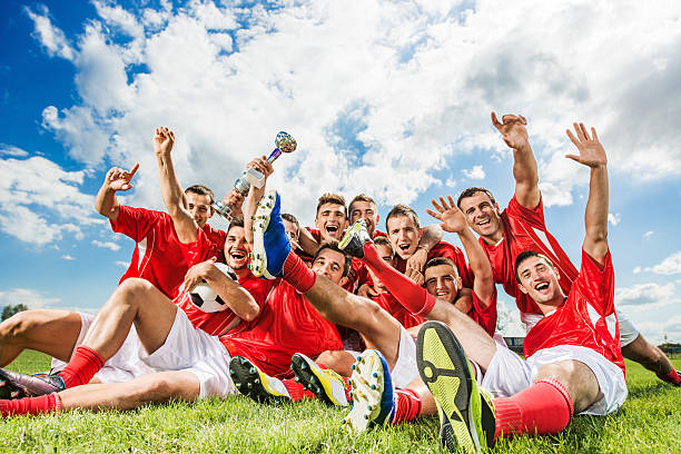 istock Soccer team celebrating victory. 494597887