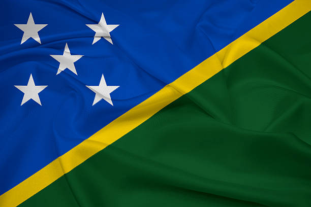 Waving Solomon Islands Flag stock photo